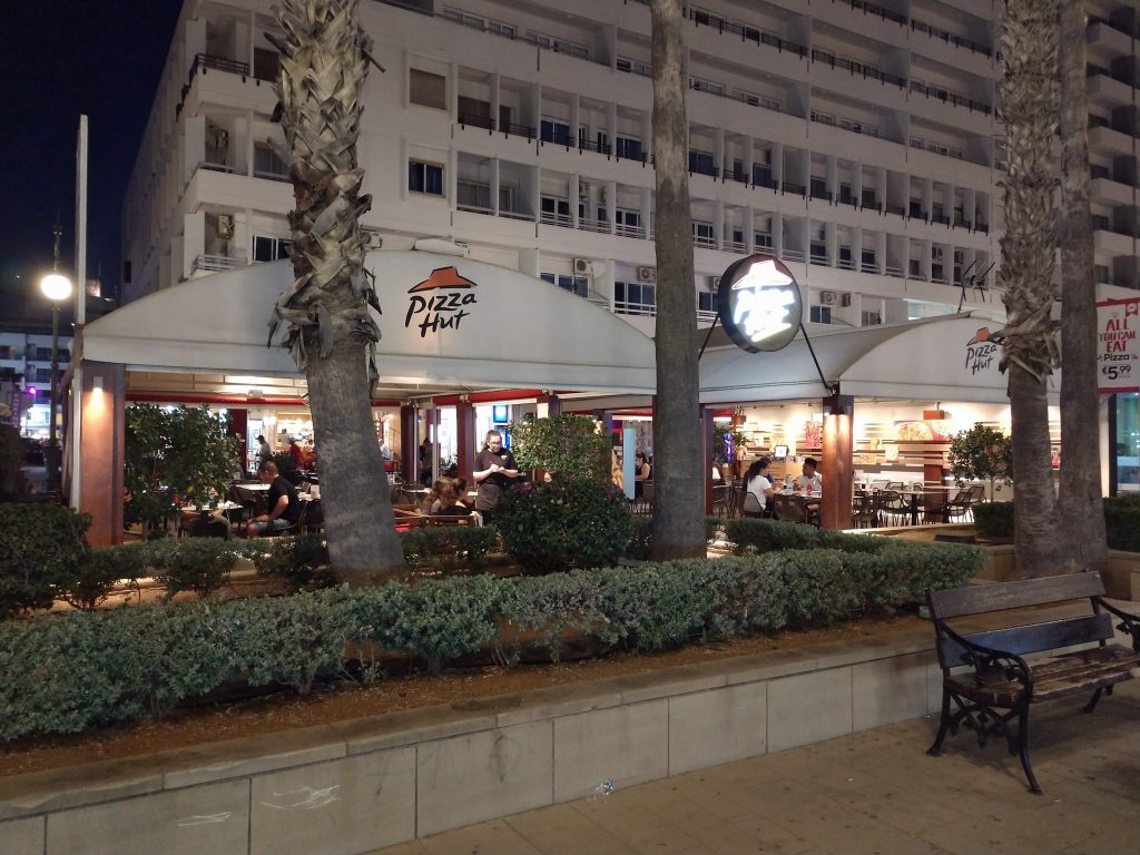 A Pizza Hut with expansive covered outdoor seating