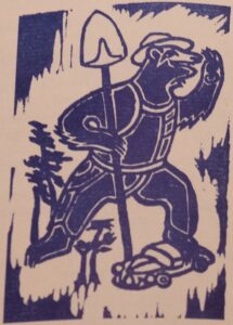 Woodblock image of Smokey the Bear holding a shovel with his right hand and surveying with his left, standing on top of a car in blue ink.