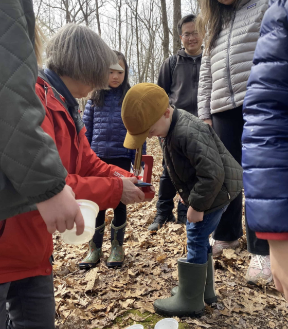 Barbara Bates, class of 1967, pictured on the left, leads a nature walk for Newton Conservators. Barbara also spends time volunteering for a hospice choir.